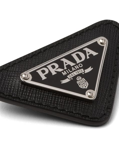 prada triangular pins